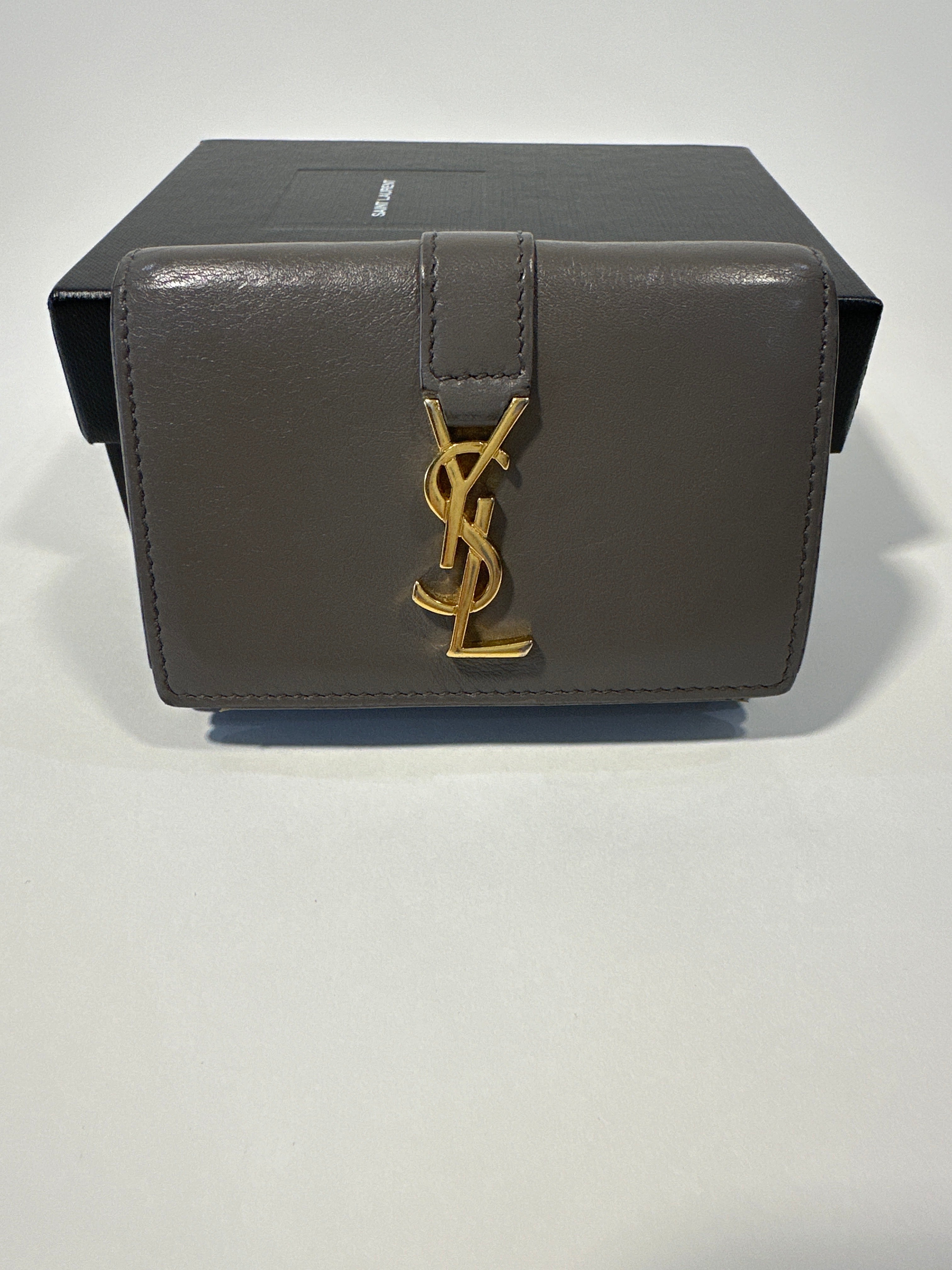 YSL tri-fold wallet with paperwork, box and dust bag.