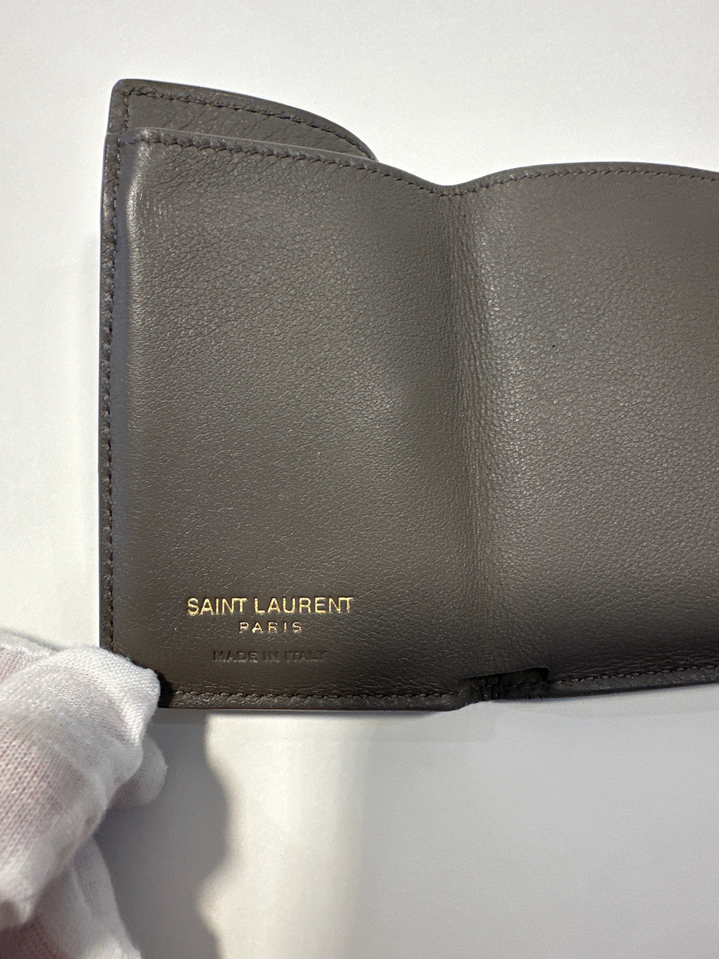 YSL tri-fold wallet with paperwork, box and dust bag.