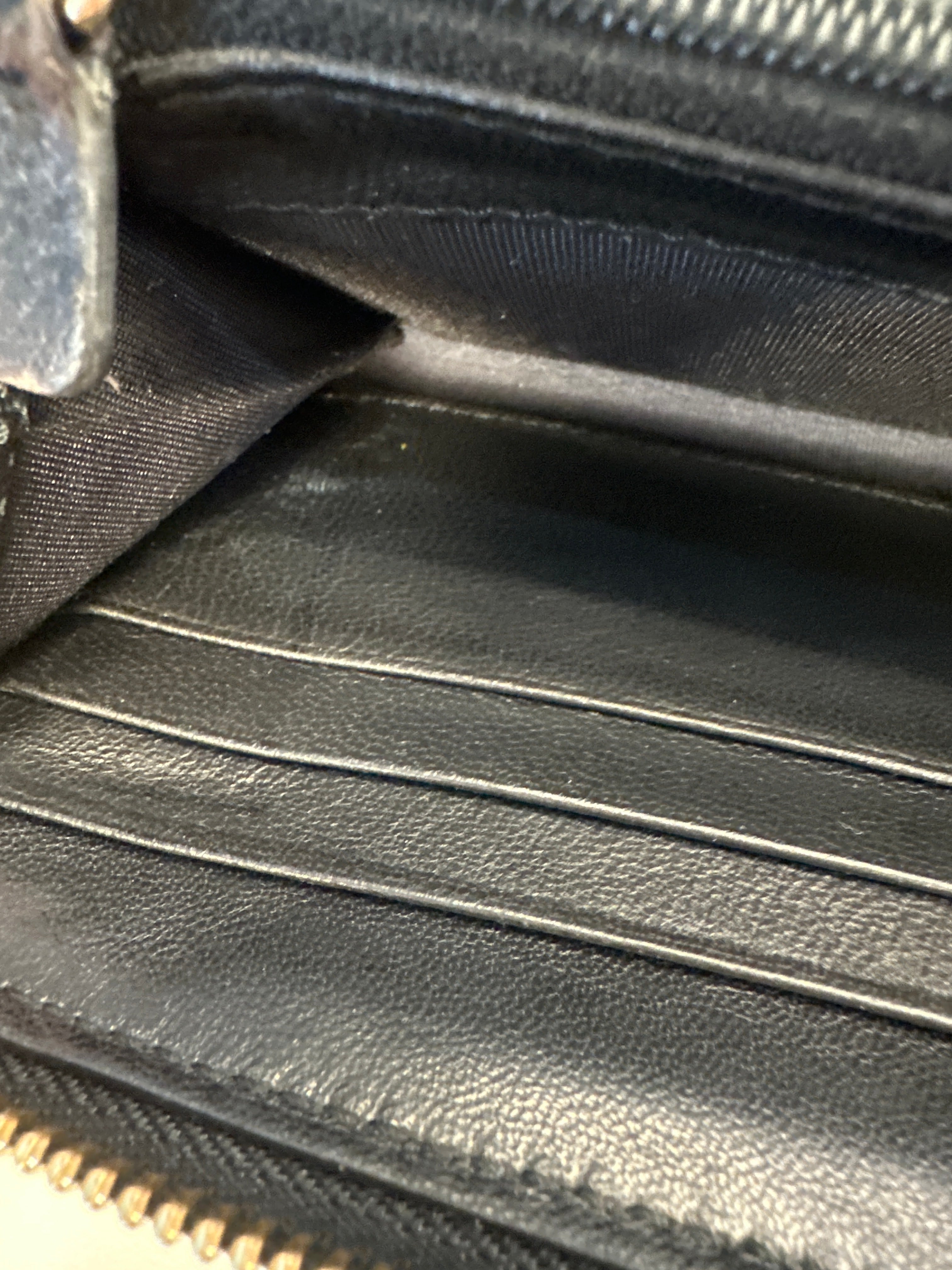 Jimmy Choo star embossed leather zip around wallet with paperwork