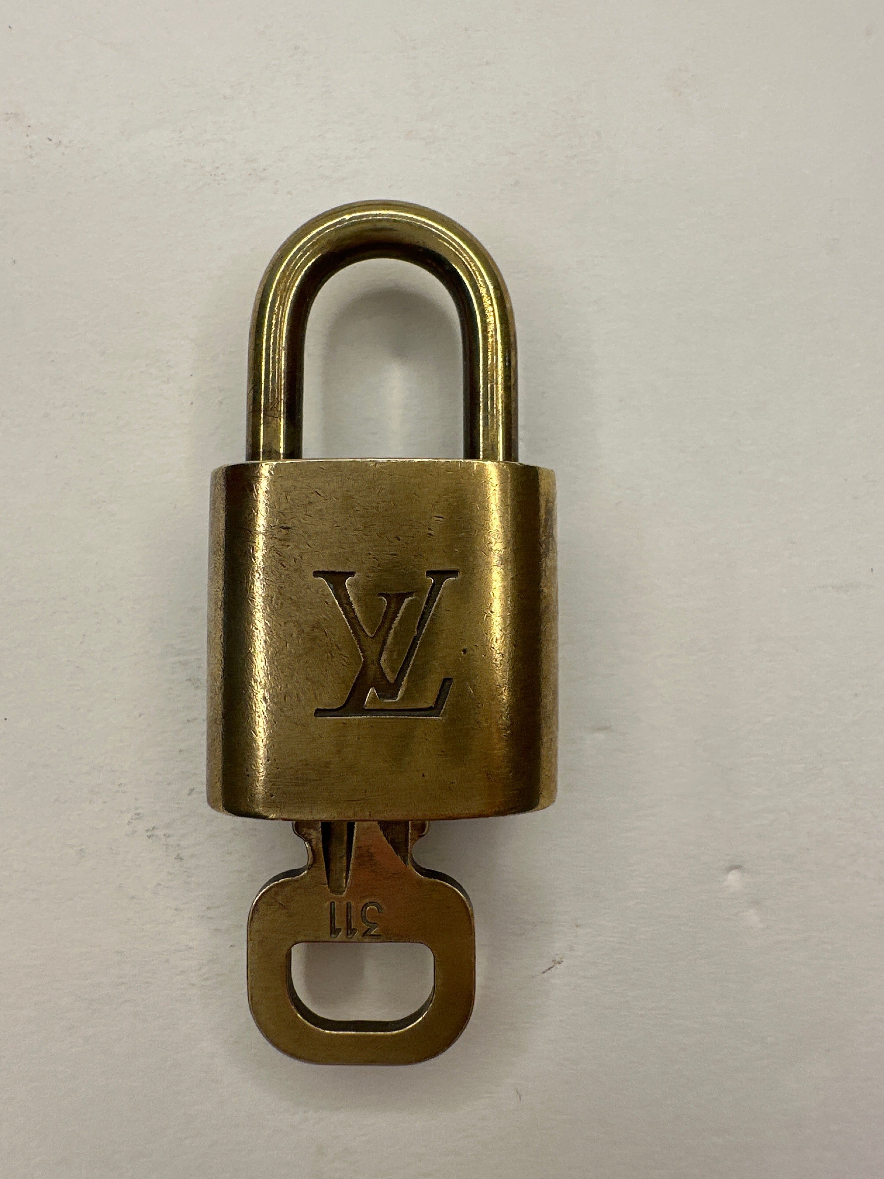 Louis Vuitton Lock & Key “311”