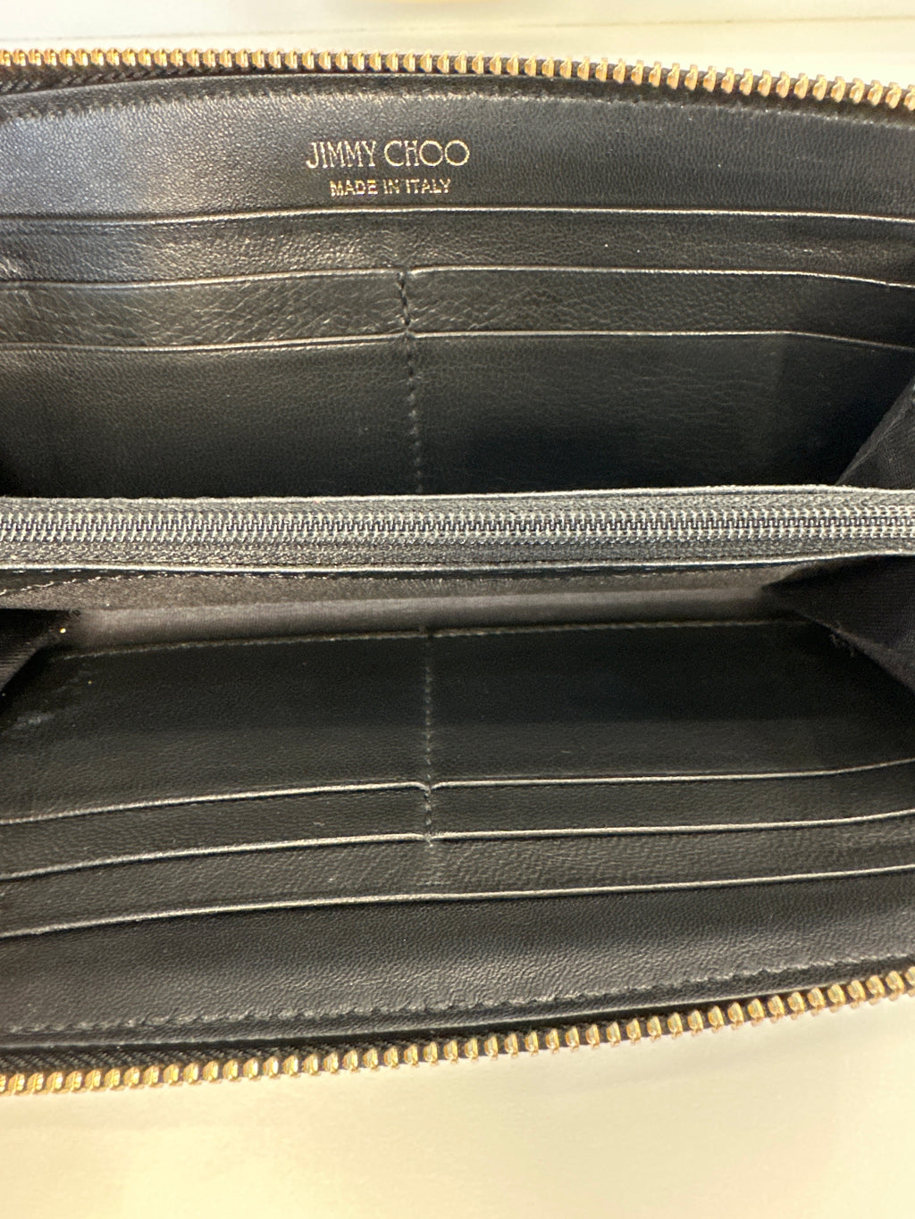 Jimmy Choo star embossed leather zip around wallet with paperwork