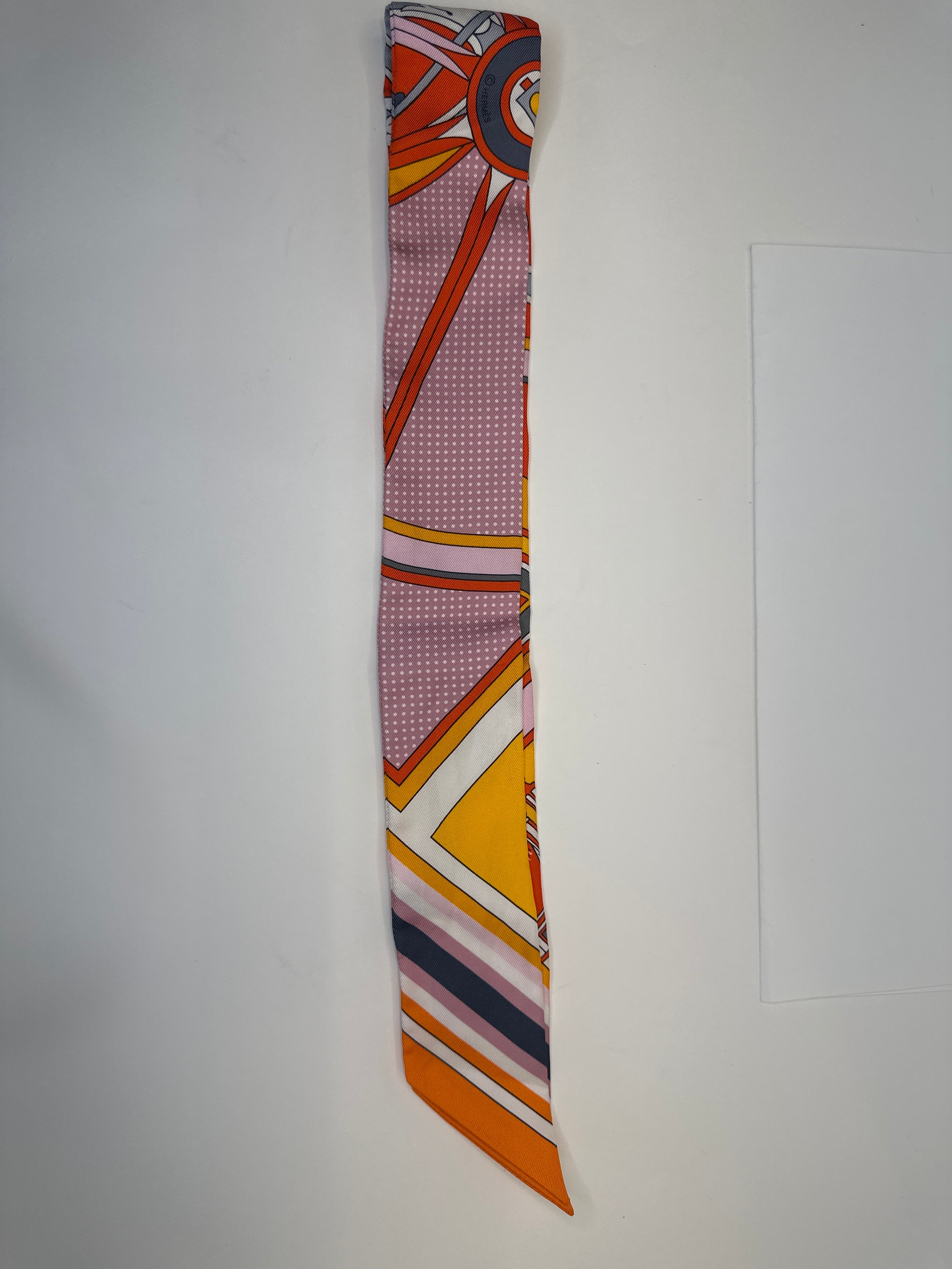 HERMÈS
Red Orange Multi Twilly