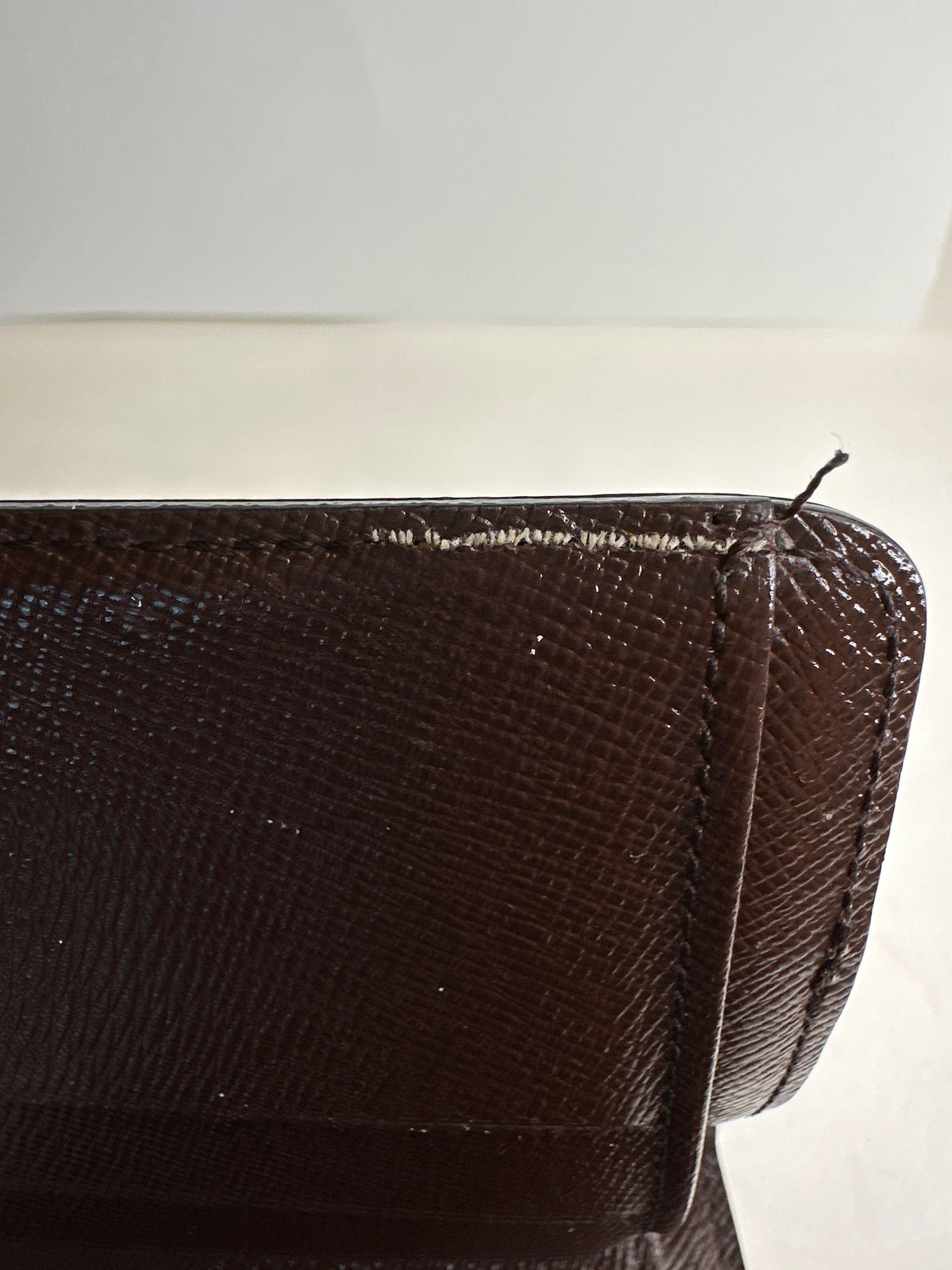 Authentic LOUIS VUITTON Damier Ebene Zippy Compact Wallet