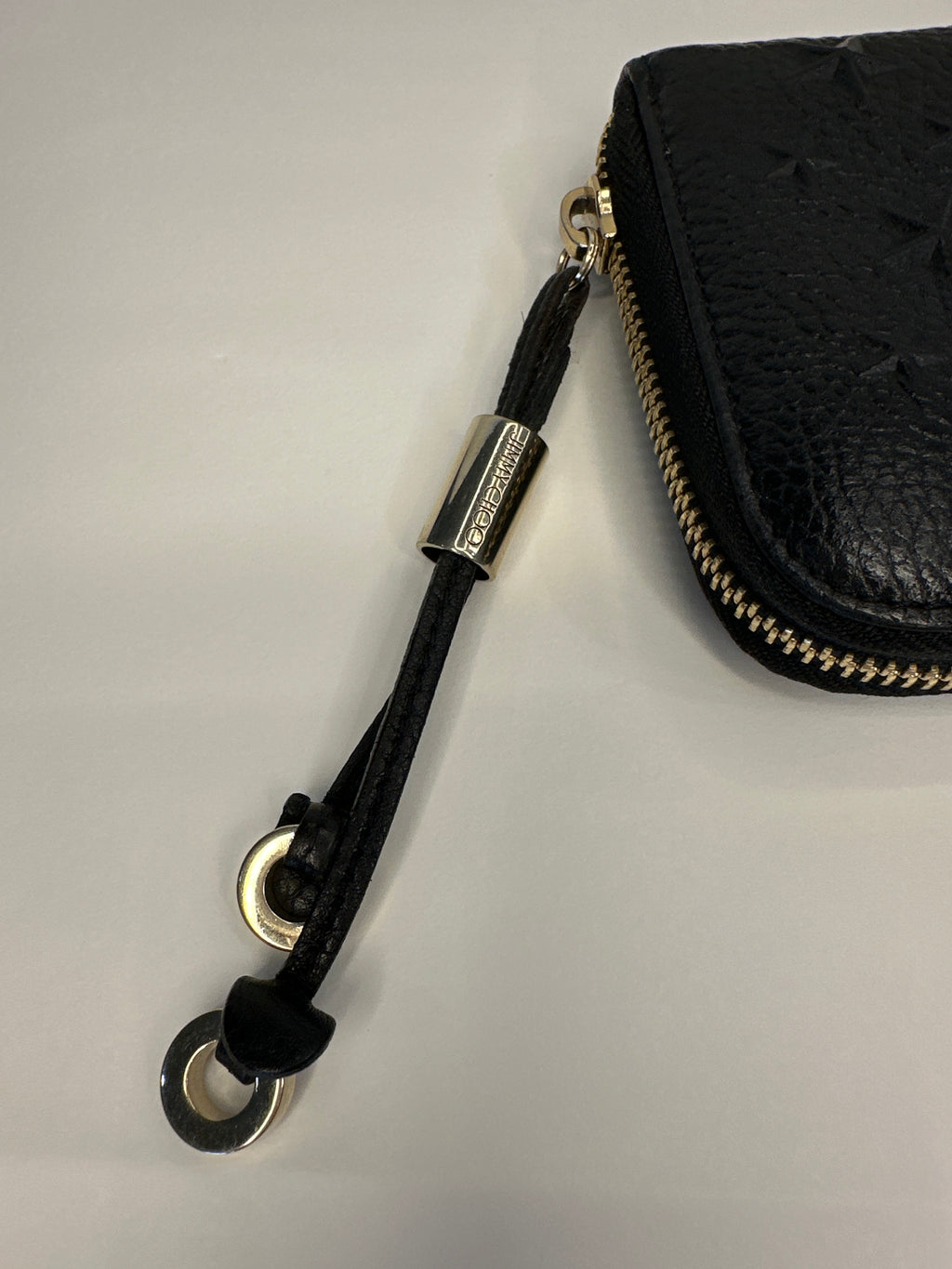Jimmy Choo star embossed leather zip around wallet with paperwork