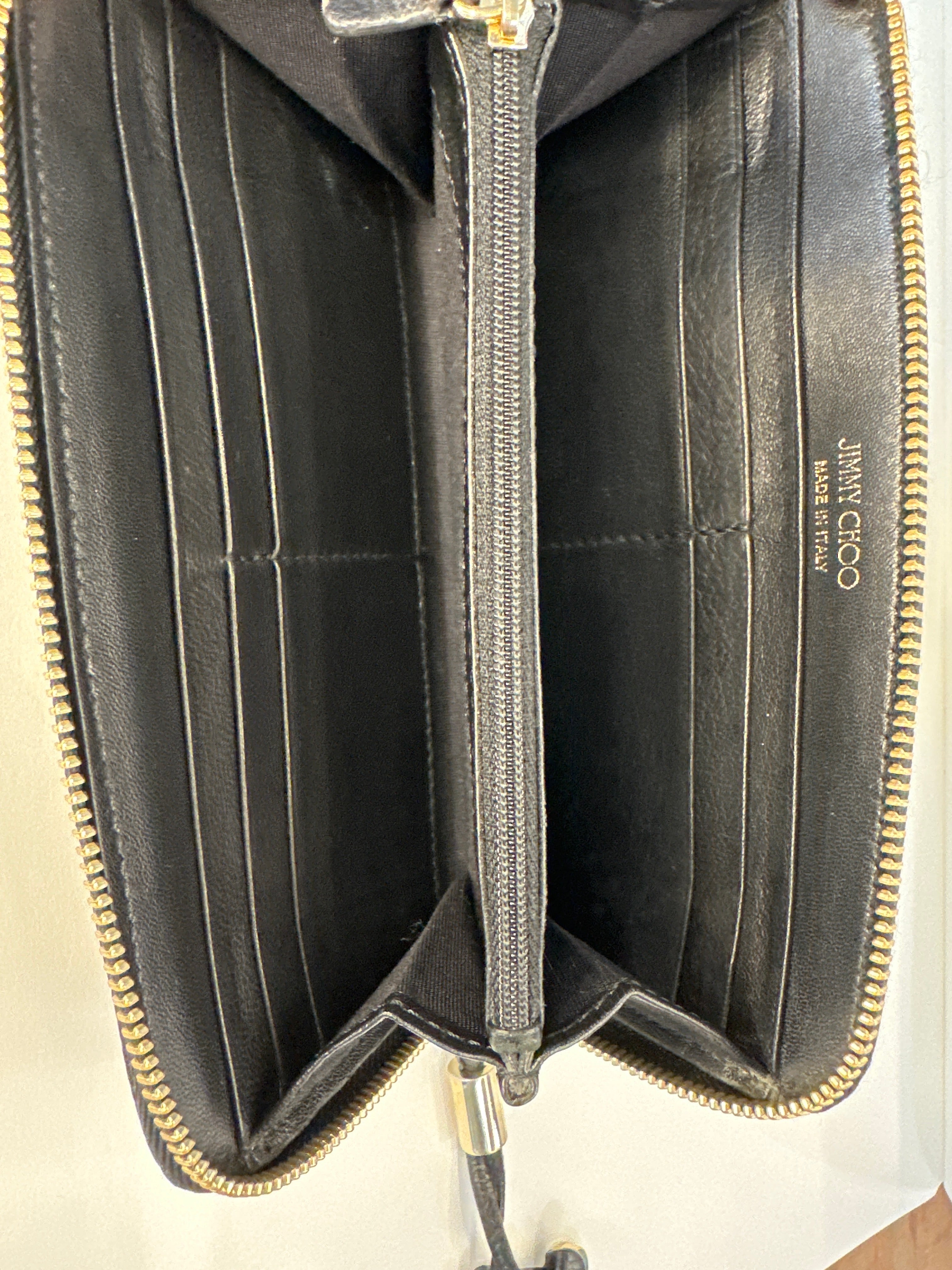 Jimmy Choo star embossed leather zip around wallet with paperwork