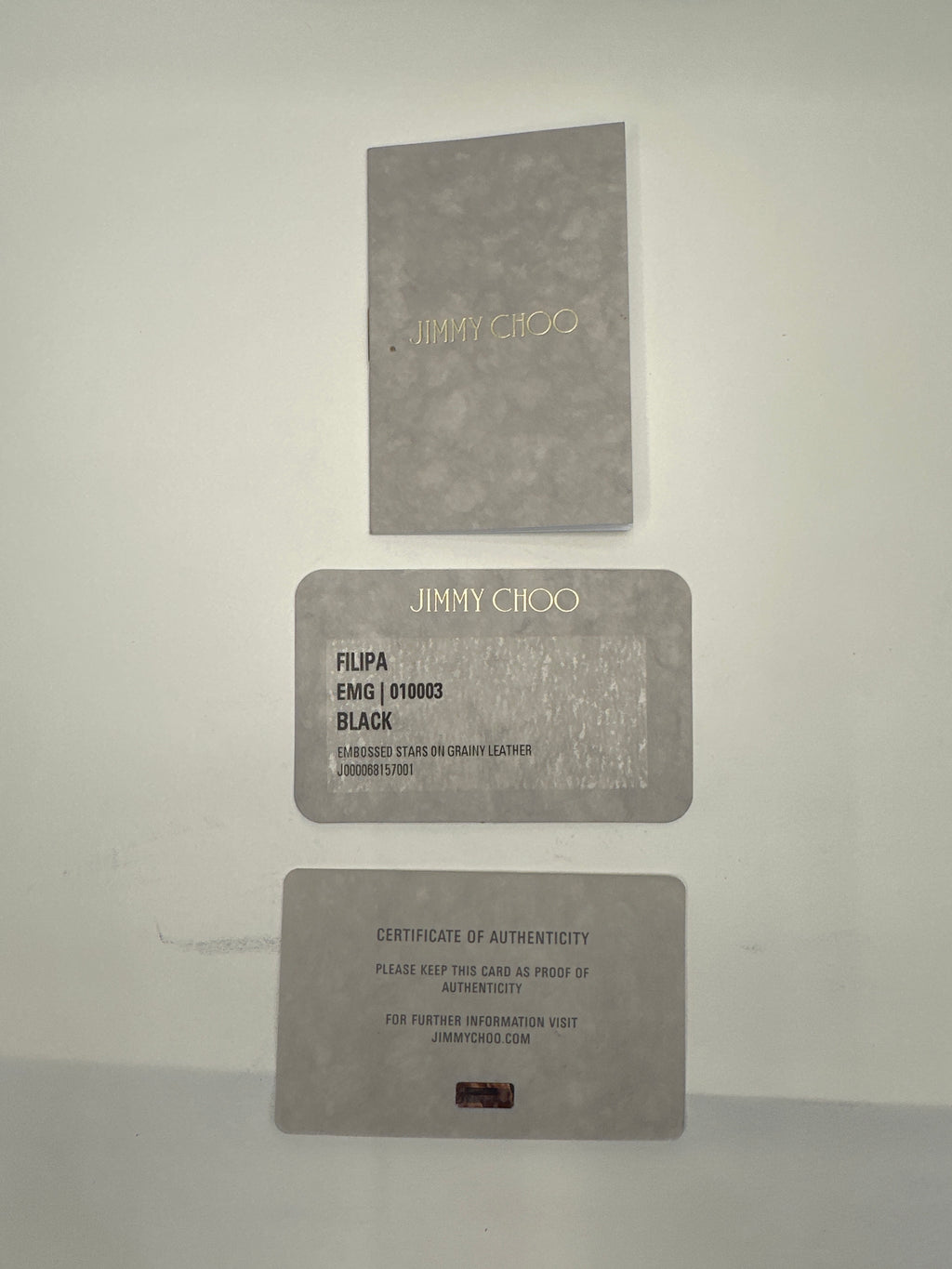 Jimmy Choo star embossed leather zip around wallet with paperwork