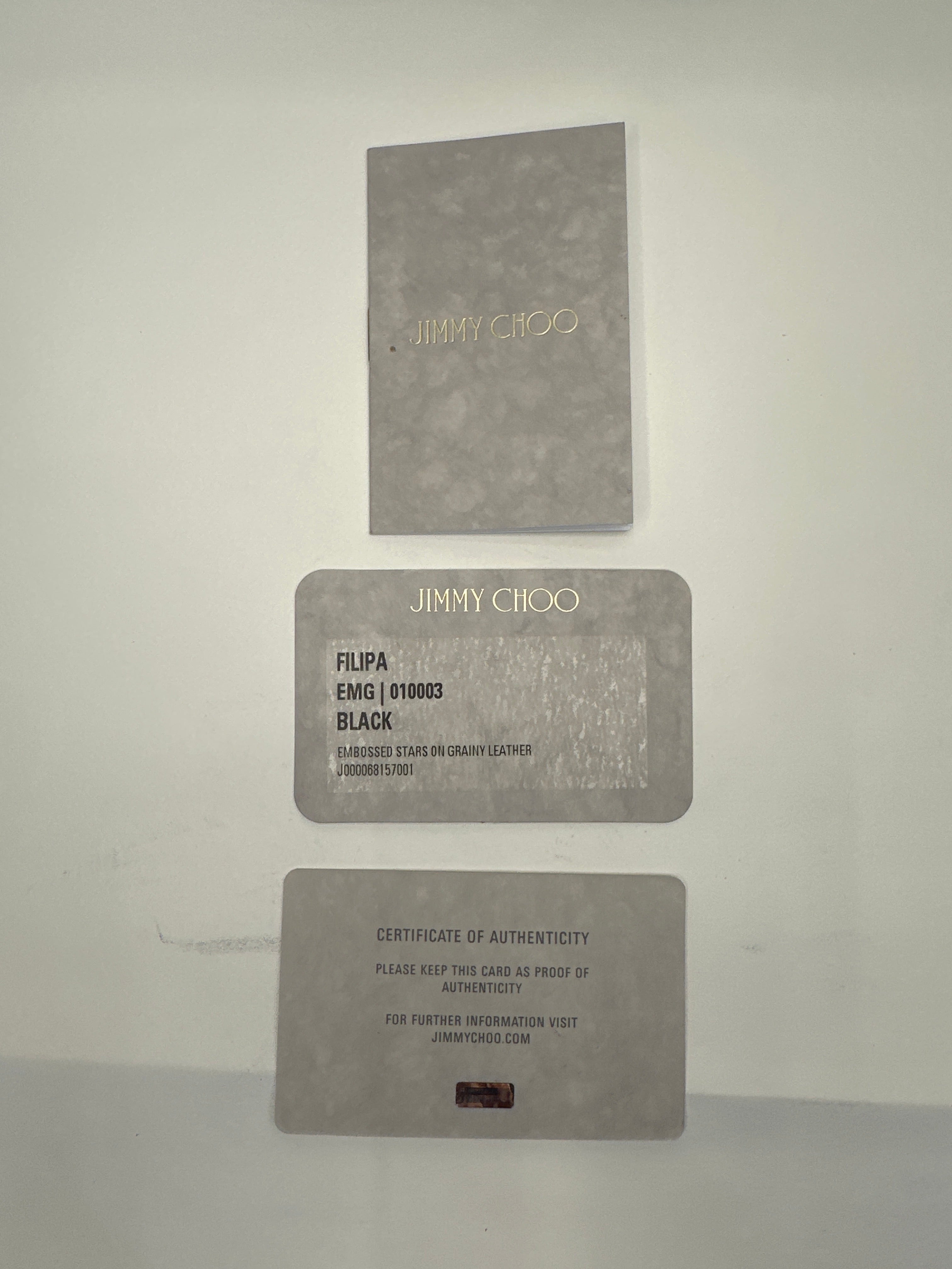 Jimmy Choo star embossed leather zip around wallet with paperwork