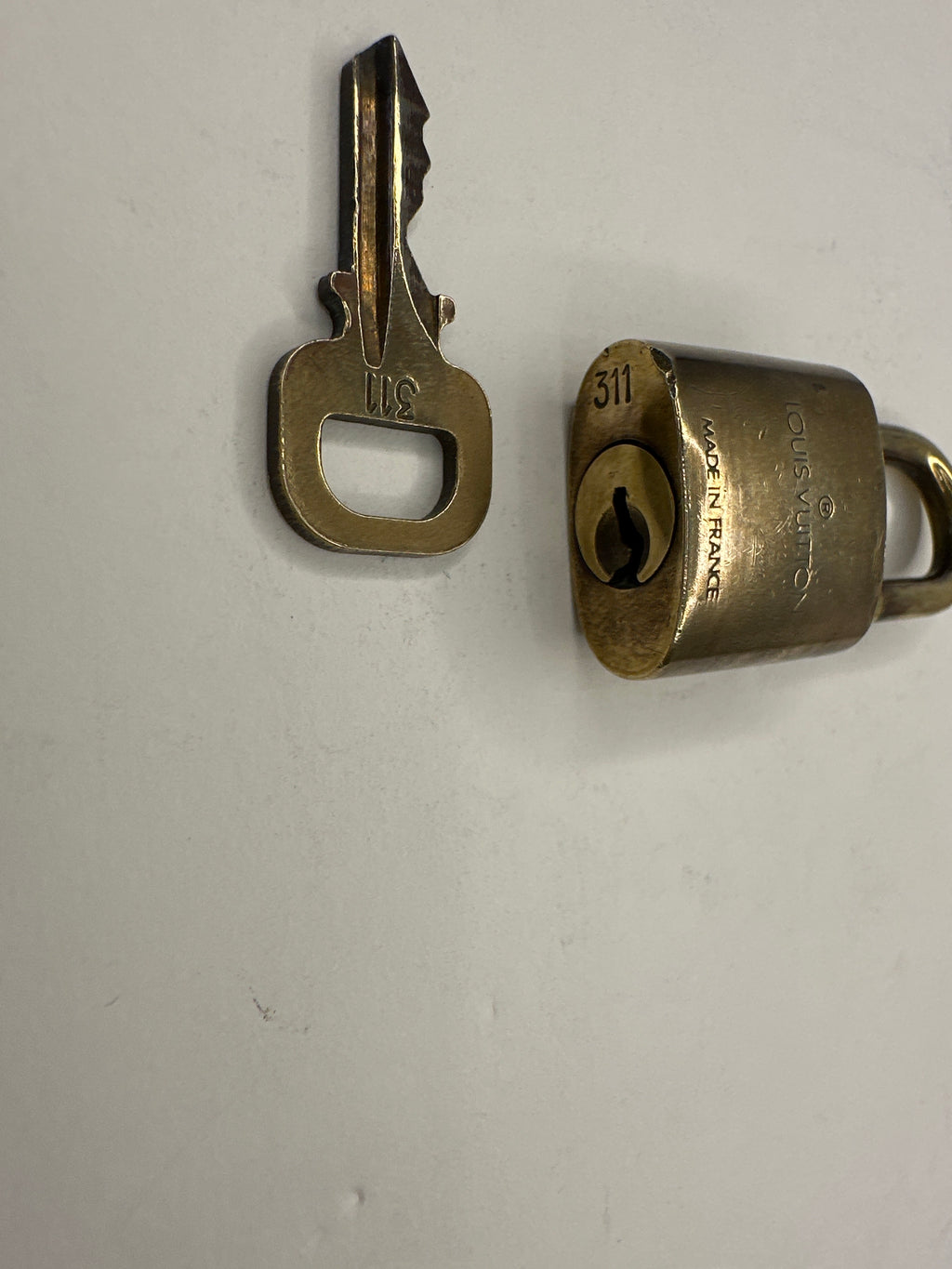 Louis Vuitton Lock & Key “311”