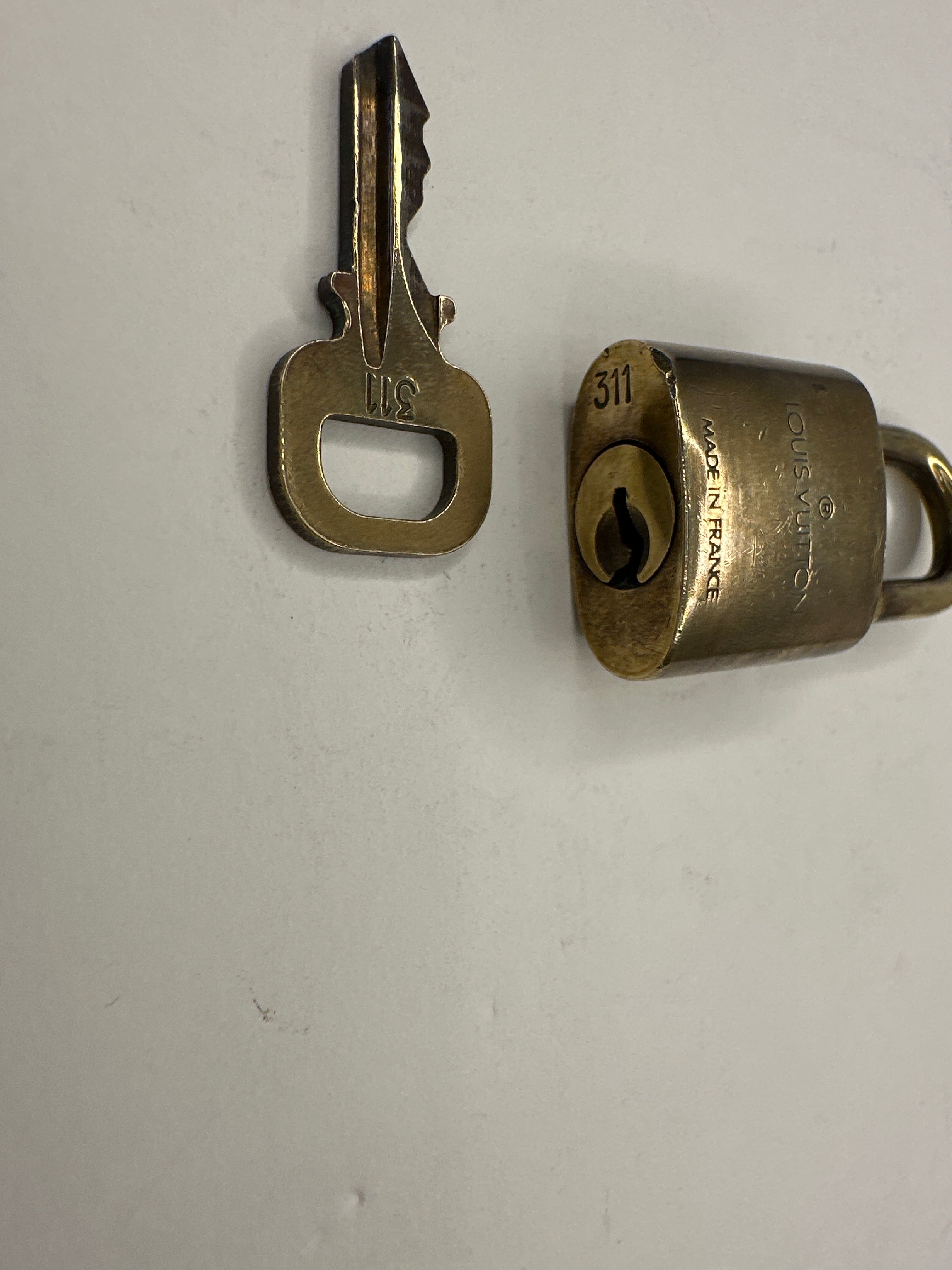 Louis Vuitton Lock & Key “311”
